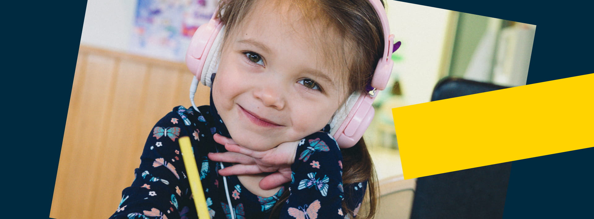 Image of child with headphones