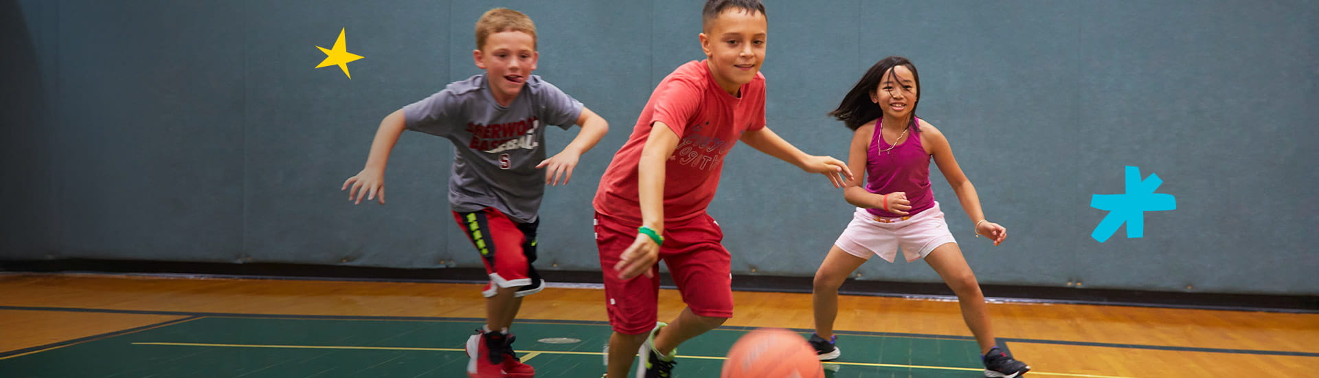 kids playing basketball in the gym