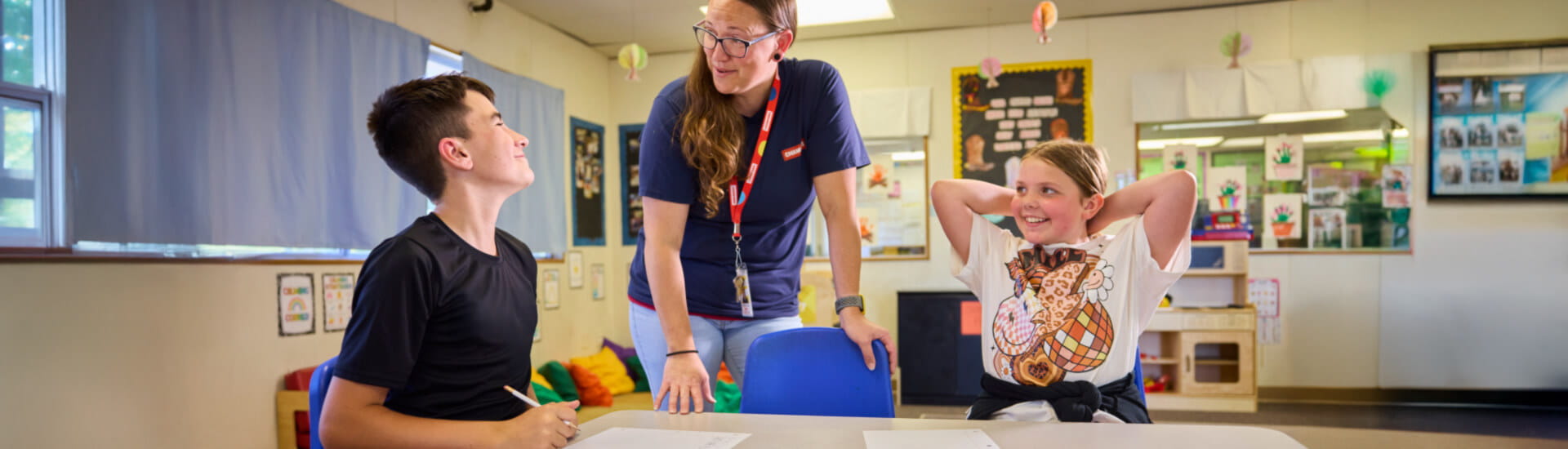 Champions teacher with kids