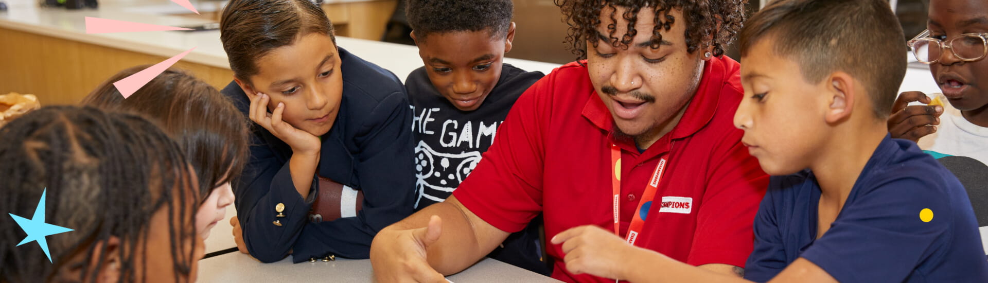 teacher helping students
