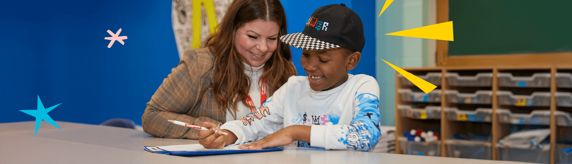 teacher helping student with homework