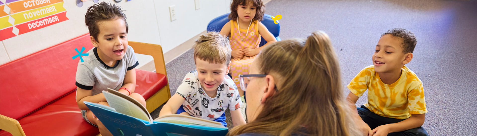 kids reading with the teacher