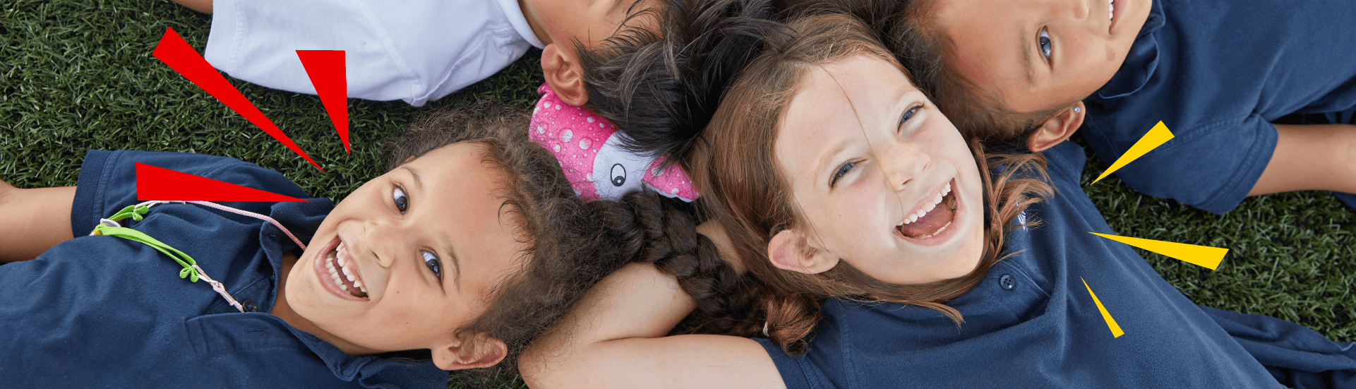 kids laying in grass