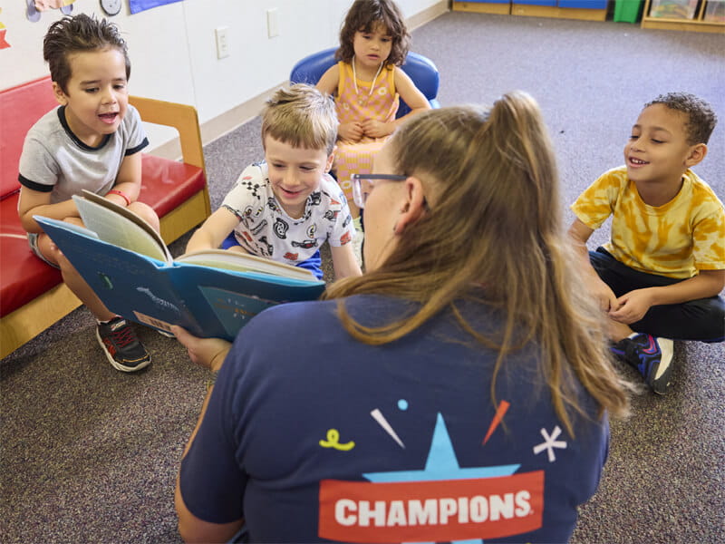 teacher and students reading