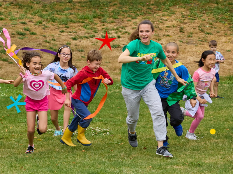 kids running in a field