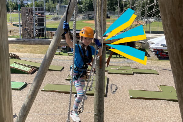 kid at a ropes course
