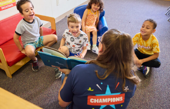 Champions teacher with kids